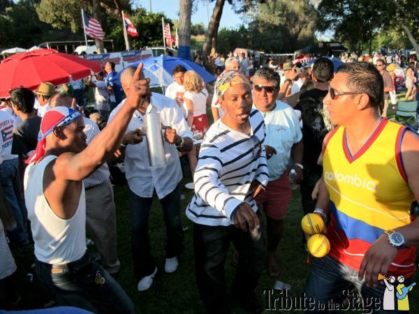 Colombians and Puerto Ricans dancing salsa at the PuertoRican Festival